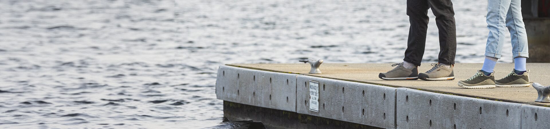 couple on row boat in the water 