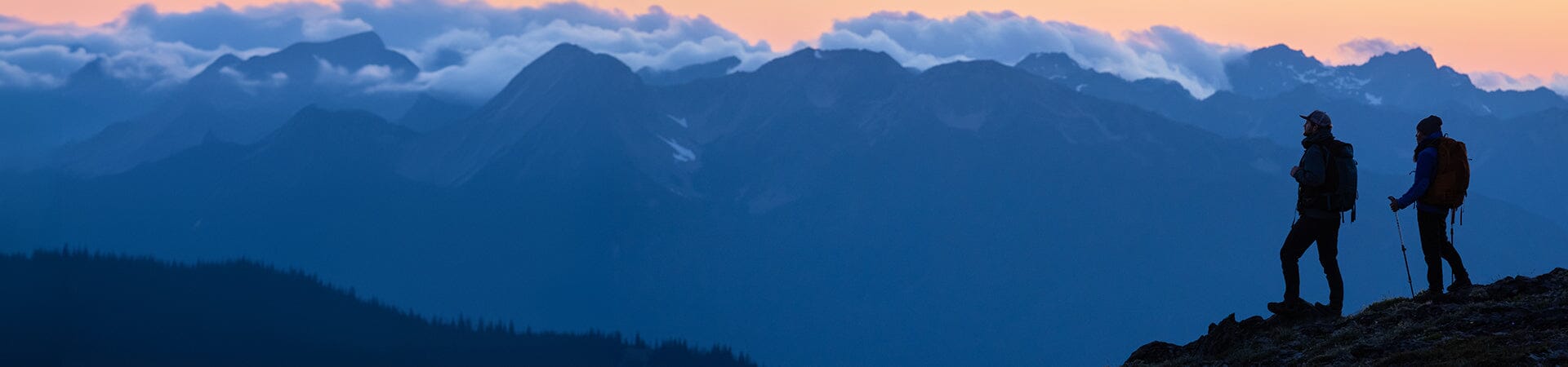 man looking out over mountains